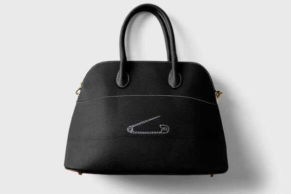 Safety Pin Linework Embroidery: A Minimalist Design for Business Branding